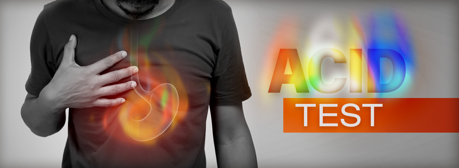 A man experiencing heartburn, rubbing his chest in discomfort.